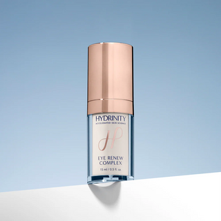 Hydrinity Eye Renew Complex 15 mL bottle on a light blue background