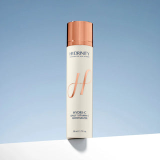 Hydrinity HYDRI-C Daily Vitamin C Moisturizer 50 mL bottle on a light blue background