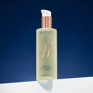 Hydrinity Prelude Facial Treatment Cleanser 180 mL pump bottle on a deep blue background