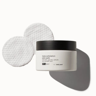 PCA Skin Triple Exfoliation Peel Pads jar with two textured peel pads